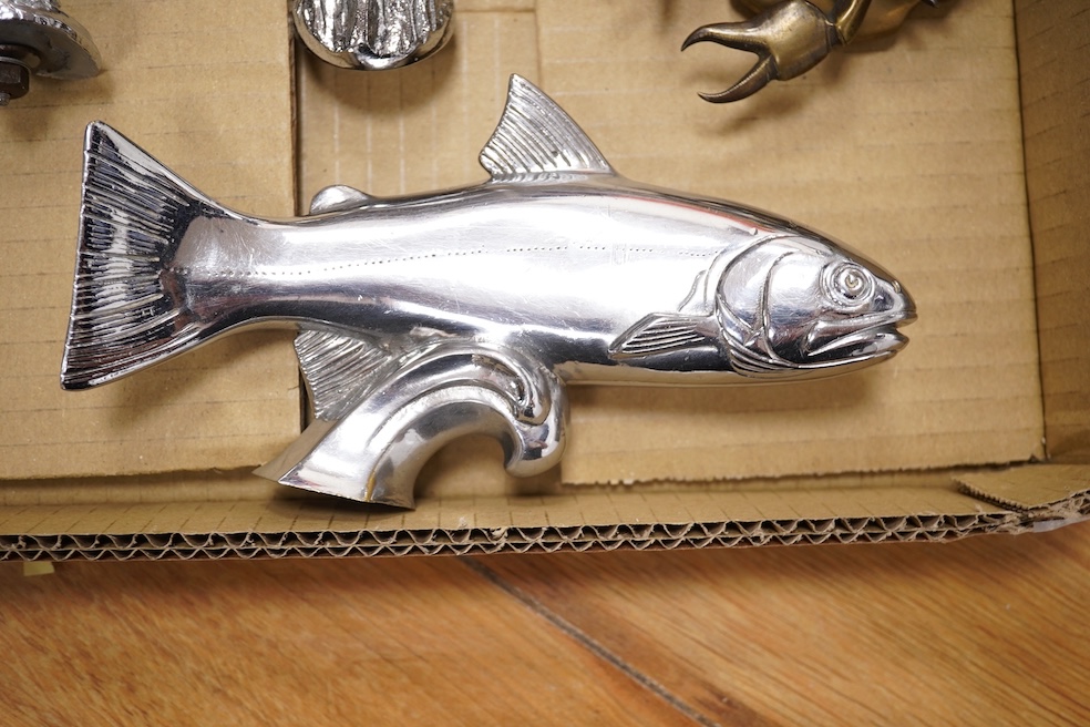 Five animal themed chrome and brass car mascots consisting of a giraffe mounted on a turned aluminium base, a hare, a bumblebee in flight, a leaping fish, and a scorpion. Condition - fair to good.